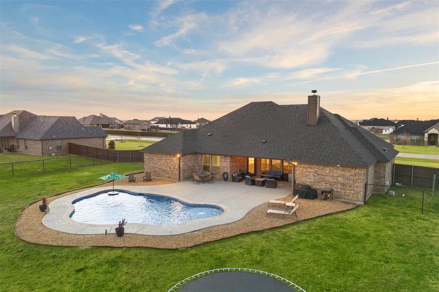 POOL, NO CITY TAXES ALL ON 1 ACRE!! Beautiful home on over 1 acre in Waxahachie with NO city taxes! This well-maintained property features 4 bedrooms, an office, 2 bathrooms, and 2,460 sq ft with an open-concept layout perfect for everyday living and entertaining. Step outside to your private backyard oasis with a beautiful pool, ideal for relaxing or hosting gatherings. The spacious lot offers plenty of room to add a shop or create the outdoor space of your dreams. Enjoy peaceful country living while still being conveniently located near town amenities.