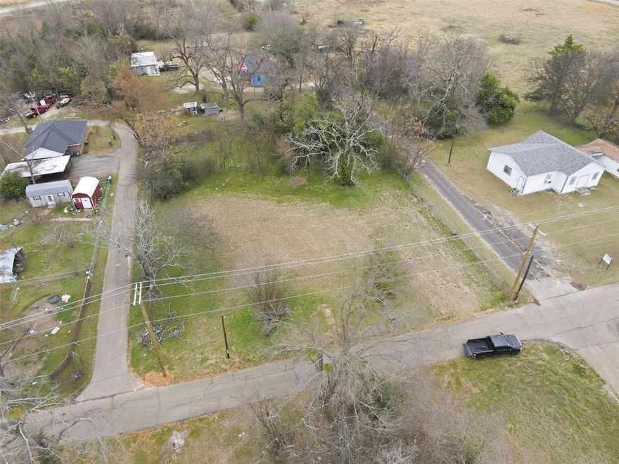 Nice corner lot with road frontage on 3 sides. Ready to build your dream home!