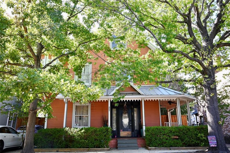 Located in one of Dallas’ most sought-after neighborhoods, known for its rich culture, art and entertainment scene, and walkable streets, this beautifully maintained 1911 Craftsman home with a charming Victorian cupola welcomes you. This one-of-a-kind, three-story gem in the vibrant Winnetka Heights Historic District, known for its architectural character, comes with modern updates. It offers unique features such as a cupola, wrap-around porch, hardwood floors and molding, a stained glass window, metal spiral staircase and custom lighting fixtures throughout. The first floor with 2 living areas, a half bath and a large backyard with pavers make this home perfect for entertaining while also featuring a chef's kitchen with a Bertzzoni gas range, expansive island and bar seating. The 2nd floor holds 3 bedrooms and 2 baths while the open 3rd floor can be utilized as a large flex space or a secondary master bedroom. Extra storage area in rear building (~96 sqft) and EV charger available in the driveway. Great opportunity for a spacious home close to Bishop Arts, Kessler Park, Steven’s Park Golf Course, Trinity Groves, Downtown Dallas and major transit routes.