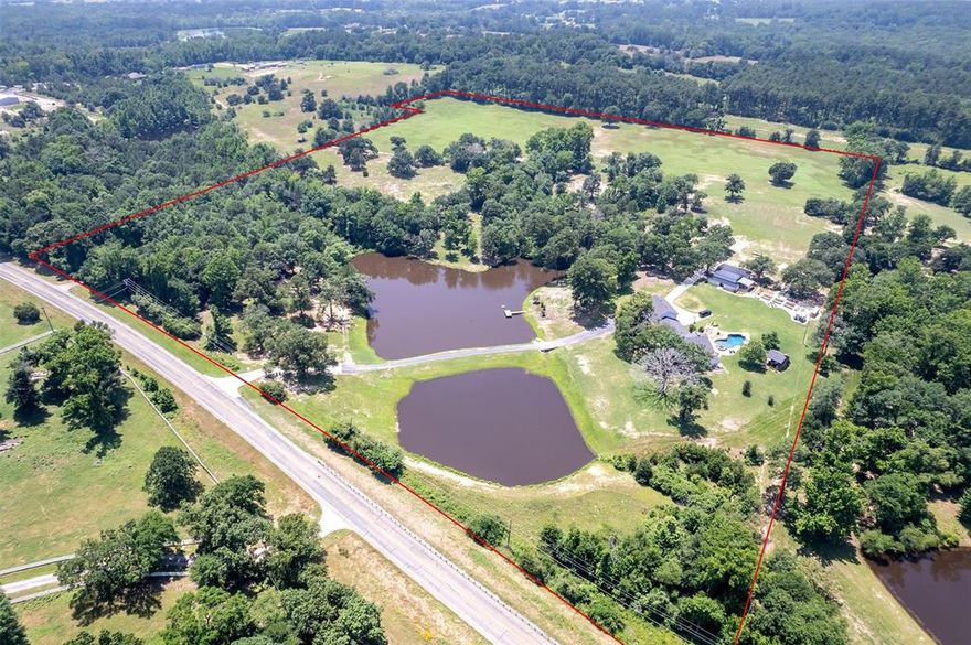 Approx half wooded and half pasture.
Main House:5,025 SF (heated and cooled), Bedrooms: 5, Bathrooms: 3.5, Garage: 3-car
Features: Pool & hot tub, 400sf cabana with wood-burning fireplace,Raised bed gardens & greenhouse,Approx 5ac of spring-fed ponds (consistent water level from 3 springs)
Renovations 2022:Transformed north end into a master suite,New HVAC system, plumbing lines,Spray foam insulation in the attic and on interior exterior walls,windows and doors,roof(November 2021)
Guest House:1,200 SF(heated and cooled),2 BR, 2 Bath, 2 Living, Porch:300sf
Renovations 2023-2024:Spray foam insulation,New lifetime water heater,Cosmetic upgrades,New roof (November 2021)
BarnShop:1,940 SF, Heated and Cooled:1,140 SF(game room),Shop:800 SF 3-car garage.
Built-in bar & bunk beds,400 SF covered patio
Renovations 2022-2023: New siding and covered patio,roof, Interior renovation with spray foam insulation, HVAC and electrical systems, Custom cabinets, countertops, and built-in bunk beds
