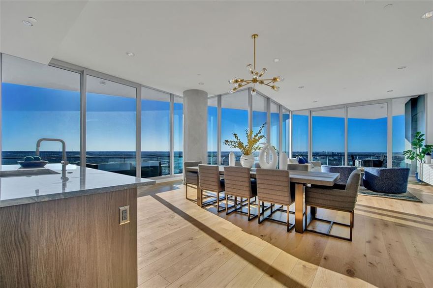 Don’t miss your chance—over 85% of our homes are already sold! This is the final opportunity to embrace the luxurious Harwood lifestyle, complete with scenic parks, delightful restaurants, and direct access to the iconic Katy Trail. Imagine breathtaking, panoramic views of Dallas from your private, expansive terrace featuring a cozy fireplace, an exclusive offering only at Bleu Ciel. This stunning 33-story architectural masterpiece, crafted by renowned Paris-based designer Jean-Michel Wilmotte and HDF, redefines elegance and modern living. As a resident of Bleu Ciel, you’ll enjoy a suite of exceptional amenities designed to elevate your lifestyle. Experience resort-style living with two junior Olympic-size pools, a fully equipped poolside kitchen, a rejuvenating spa, and a sophisticated wine lounge complete with a dedicated wine room and storage. Host meetings in two plush executive boardrooms equipped with state-of-the-art audio and visual technology, unwind in the social room with its cozy library, or retreat to your own private garage. Stay fit and rejuvenated in our cutting-edge fitness room, which includes a private yoga studio, or enjoy the pet area designed with your furry friends in mind. And with 24-7 concierge and valet services, every detail is taken care of, allowing you to enjoy life to the fullest.
Experience sky-high living at its absolute finest, featuring floor-to-ceiling glass windows, luxurious Porcelanosa cabinetry, and premium Miele appliances. Your dream home awaits.