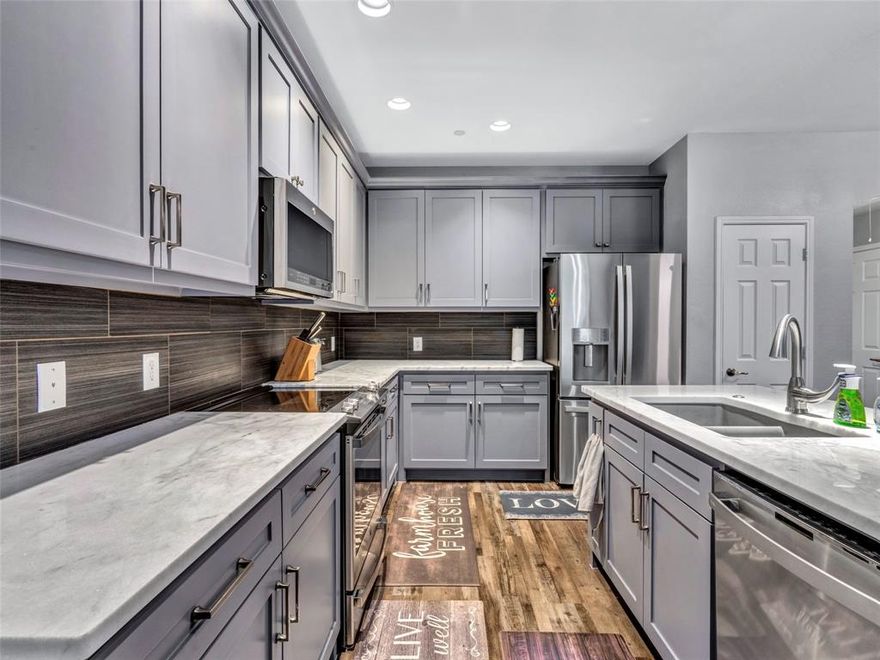 Beautiful townhouse that has been exquisitely updated throughout in the highly desirable community of Pasquinellis Village on the Green. This adorable two bedroom two bathroom home has expansive open living and kitchen areas and is truly move-in ready and will feel like new. Kitchen is built for entertaining with a huge island, tons of cabinet space, and stainless steel appliances. Large bedrooms and closets with tastefully renovated bathrooms. Exterior maintenance including roof and yard care, handled by the HOA! Great neighborhood pool with tons of open green community space. Pet friendly with pet waste stations! GREAT LOCATION! Minutes from Hwy 121, 75, 380, restaurants, shopping, entertainment, hospitals, libraries, schools, parks, walking and biking paths!