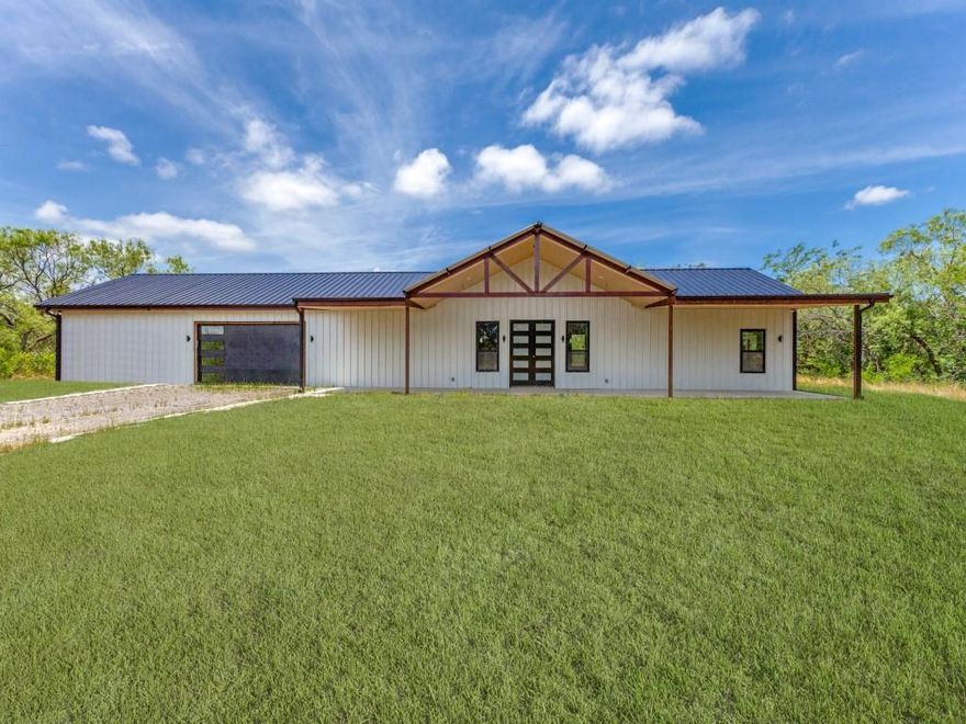 Welcome to this stunning 2024-built barndominium nestled on 12 private acres in Kaufman, Texas. Perfectly blending modern design with rustic charm, this property offers the ideal balance of comfort, style, and country living. Step inside to discover an open floor plan filled with natural light, sleek finishes, and plenty of space to make it your own. The kitchen is a true showstopper, featuring beautiful marble countertops and modern cabinetry—perfect for entertaining or quiet nights at home. Outdoors, the possibilities are endless. With 12 sprawling acres, there’s room to roam, build, or simply enjoy the peaceful setting. The land is teeming with wildlife—deer and hogs are frequent visitors—making it a dream location for hunters or nature enthusiasts. Please note this home is not fully complete, 90-95% done. Sellers are willing to negotiate an amount to the buyer towards their closing costs.