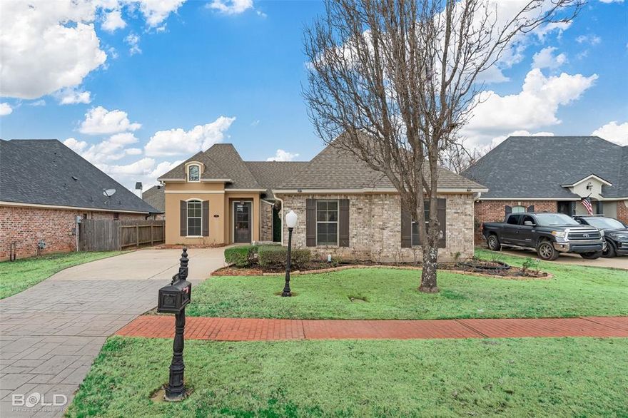 Move-in ready 1,902 SF home featuring 3 bedrooms and 2 bathrooms in the gated St. Charles Court community of North Bossier. This thoughtfully designed home offers a spacious open layout, a dedicated office, and no carpet throughout—ideal for easy maintenance (2022 water heater) and modern living. The kitchen boasts ample cabinetry, and the refrigerator stays! Enjoy outdoor living on the covered patio, perfect for year-round entertaining. Conveniently located near I-220, BAFB, and within walking distance to Kingston Elementary and Benton High School, plus just minutes from North Bossier’s premier shopping and dining.