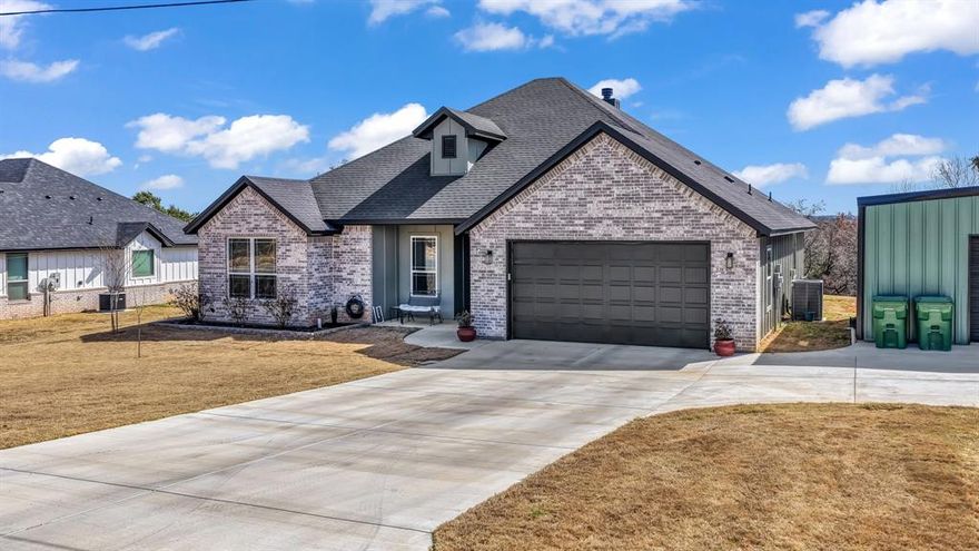 2024 CONSTRUCTION in a gated lake community! This 4-bedroom, 2-bath home offers a modern open-concept layout filled with natural light. The kitchen features custom-built cabinets, granite countertops, and a custom tile backsplash. Both bathrooms include custom tile work and custom vanities, with a double vanity in the primary suite. Additional highlights include a custom brick chimney, energy-efficient insulation, high-efficiency HVAC, and energy-saving water heater. Situated on a large lot with a huge shop and plenty of additional space. Enjoy modern design, quality craftsmanship, and lake community living — schedule your showing today!