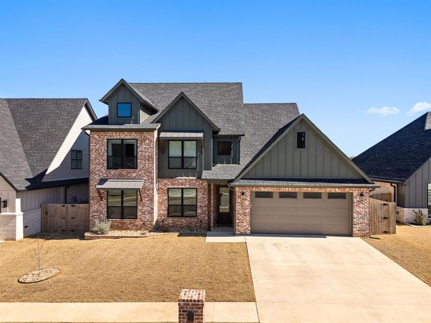 Built in 2023, this custom 5-bedroom, 4-bath home offers 2,966 square feet of stunning, light-filled space designed with both beauty and function in mind. You’re greeted by soaring ceilings and a bright, open interior from the moment you step inside. The living room is a true focal point, featuring a gas log fireplace framed by custom built-ins on each side. It opens seamlessly into kitchen and dining area, ideally positioned for easy entertaining and everyday flow. The kitchen truly shines with tall, custom cabinetry that draws the eyes upward, while the oversized island with ample prep space and seating anchors the space beautifully. Premium finishes and thoughtful design - including marble countertops throughout - makes this home just as practical as it is impressive. The private primary suite offers a peaceful retreat with automatic window shades and a spa-inspired bath, while additional bedrooms and an upstairs flex space - currently styled as a bold, color-drenched media room - provide flexibility for an office or bonus room. The backyard setting stands out as one of the few homes in Oak Creek that backs to an open, green space. The covered outdoor patio is built for hosting and entertaining, complete with a built-in BBQ grill and outdoor kitchen setup. Located in the highly desirable Oak Creek community, residents have access to premier amenities including tennis courts, a community pool, and a soccer field. The media room screen will stay with the home while the projector and kitchen refrigerator are negotiable. Bright, elevated, and thoughtfully designed - this is the kind of home that stands out the moment you walk through the door. Schedule your showing today!