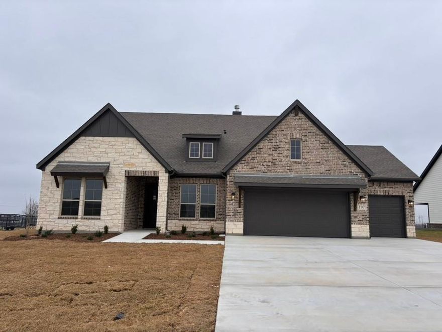 Estimated March 2026 completion! Ask about our Trade In Trade Up program, we can buy your home! Stunning lot located minutes away from play park, amenity center and pickleball court. Close to mailbox, full sod and irrigation included. FIREPLACE, COVERED PATIO, FULL FOAM INSULATION, ENERGY STAR CERTIFIED BUILDER. Owner financing available. Upon entering the home off the front porch, you’re welcomed by an inviting foyer. Immediately to the left is a hallway with a bedroom, walk-in closet and full bathroom, as well as a linen closet. Across the foyer is a flex room, perfect for a home office, formal dining room or whatever need your family has for the space. Past the foyer is the family entry, with storage space and mud bench, which leads to the laundry room and two or three car attached garage. Through the entrance, the home opens up to a large family room with a stately fireplace. Adjacent to the family room is a gourmet kitchen, equipped with a walk-in pantry, ample counter space and an oversized island. Finishing off this open-concept living area is a dining space which overlooks the covered back patio. The remainder of this one-story floor plan is just off the living space. A hall leads to two bedrooms with walk-in closets, another linen closet and a shared full bathroom. The back corner of the home offers privacy for the owner’s suite, featuring a massive walk-in closet and bathroom with a dual-sink vanity, standalone soaking tub and glass-enclosed shower.