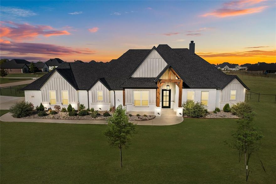 BINGO! This custom-built LIKE-NEW home in the beautiful and gated Las Palomas Estates is just what the Doctor ordered. The grand entryway welcomes you into this jaw-dropping property highlighted by modern finishes with tasteful charm. Designer grade fixtures, hand-picked chandeliers, custom cabinetry, and much much more adorn this show-place from top to bottom. The coffered ceilings add depth to a HUGE yet comforting common room perfect for entertaining and family gatherings centered around an ornate gas fireplace. With quality craftsmanship throughout, this home provides a spacious, well-designed layout that maximizes comfort and functionality. This gorgeous home features oversized secondary bedrooms with HUGE closets and an abundance of natural lighting.  Your primary bedroom functions as your own private oasis with vaulted ceilings and the primary bathroom is adorned with hand-picked fixtures and an oversized soaking tub. This home features both a Game-Room AND a workout room to help you make sure that all your bases are covered. Newly installed custom landscaping highlights the exterior, this one is ready to GO! Come say hello to this one while you can!