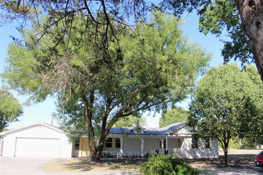 Country living at its finest only minutes from downtown Sherman and Austin College.  Completely updated home that sits on an acre with front porch, fig, pear, and peach trees. 4 bedrooms, 2 living areas, 1 study, 3 full baths and 2 car garage. Huge kitchen with SS appliances, white cabinets, granite countertops, lots of counterspace, decorative lighting, tile backsplash, and area for huge kitchen table. Luxury vinyl flooring throughout living and bedrooms.  All bathrooms updated with dual sinks in the master.  Ceiling fans and canned lighting in bedrooms.  Kitchen opens up to great size living area.  Separate utility area with enough room to have shelves and extra storage. Very clean and bright with natural light flowing throughout.  Backyard has deck and cellar. Tenant is responsible for maintaining yard and septic tank. One acre is included with rent; however, owner has more acreage that they would be willing to lease.  Agents, please see private remarks for application process.