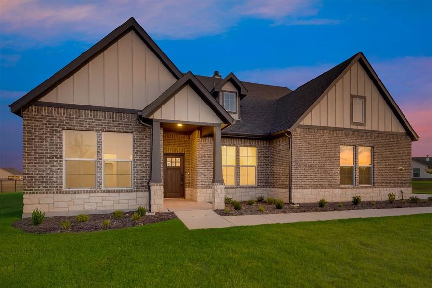 Upon entering the home off the front porch, you’re welcomed by an inviting foyer. Immediately to the left is a hallway with a bedroom, walk-in closet and full bathroom, as well as a linen closet. Across the foyer is a flex room, perfect for a home office, formal dining room or whatever need your family has for the space. Past the foyer is the family entry, with storage space and mud bench, which leads to the laundry room and two or three car attached garage. Through the entrance, the home opens up to a large family room with a stately fireplace. Adjacent to the family room is a gourmet kitchen, equipped with a walk-in pantry, ample counter space and an oversized island. Finishing off this open-concept living area is a dining space which overlooks the covered back patio.