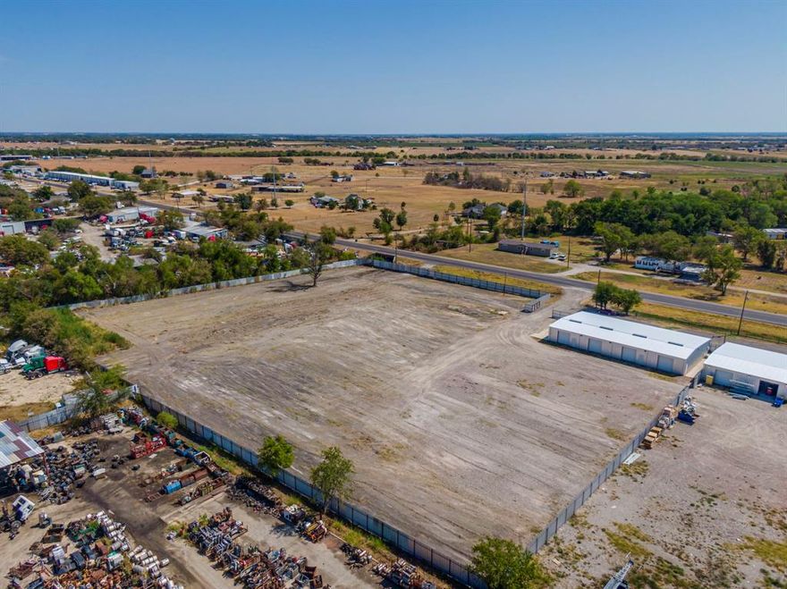5 acre property with 3 metal warehouses 2 with heated and cooled office spaces. Property is fully fenced with solid metal fencing and gates. Highway 77 access and backs up to I35E just south of Waxahachie. And Just north of Hillsboro and the I35W split. Outside Waxahachie city limits.