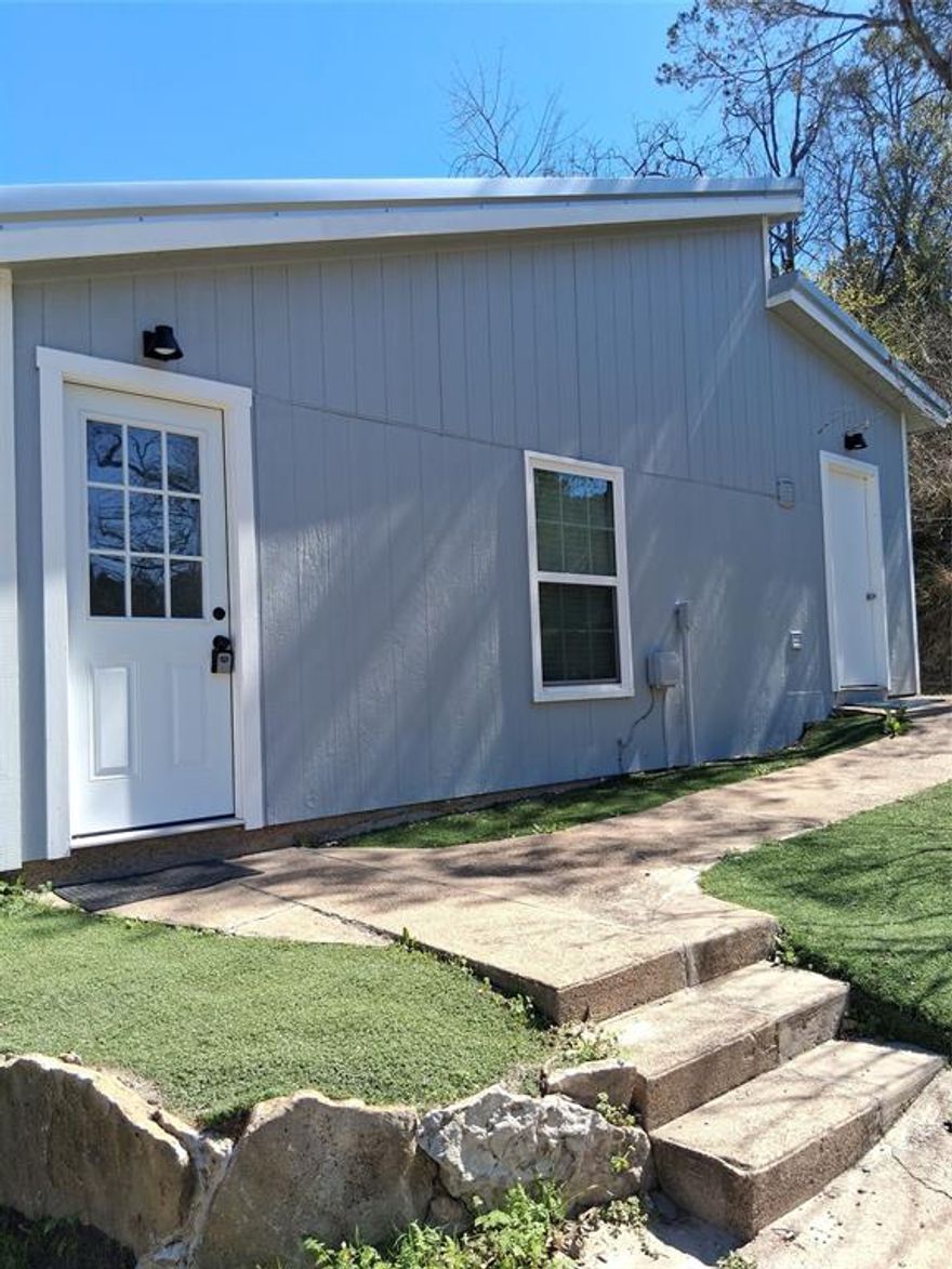 Nestled on over an acre in the quiet Rolling Hills Shores community near Weatherford, this property offers the perfect blend of space, privacy, and country living while still being conveniently close to town. The home features comfortable living areas, a functional layout, and plenty of natural light throughout. Featuring a guest house, the spacious lot provides ample room for outdoor entertaining, gardening, or simply enjoying the peaceful surroundings. This property also includes an ADU, guest house which is 390 sqft.