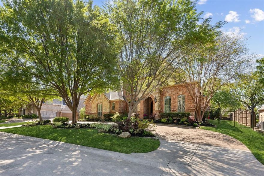 Welcome to the prestigious Timarron Golf Course community! Walk down the street and you can enjoy the country club with golf, restaurant, gym and more. Thoughtfully updated custom home offers soaring ceilings, crown molding, solid core doors and beautiful hardwood floors. At the heart of the home lies the chef's kitchen, a culinary masterpiece featuring top-of-the-line Viking appliances, including a six-burner gas range, dual convection ovens, built-in microwave, and warming drawer. The centerpiece is a substantial Carrera marble island, offering ample workspace and storage, perfect for culinary creations and casual dining alike. The main-floor offers grand foyer, study, formal living, formal dining and private guest suite. Master suite is an ideal retreat for relaxation, complete with a private entrance to the backyard. The spa-inspired ensuite bathroom boasts a soaking tub, separate shower, dual vanities, and a spacious walk-in closet, providing a serene escape from the everyday. The upper level reveals three additional bedrooms and a versatile game room, catering to both family living and guest accommodations. The home's multiple living areas, including study and formal dining room with a butler's pantry, ensure every need is met with style and functionality. Step outside to discover a private backyard retreat, featuring a sparkling in-ground gunite pool with captivating water features. The expansive covered patio and meticulously landscaped grounds offer a beautiful setting no matter the occasion. Situated on a 0.36-acre, the estate provides a perfect balance of privacy and convenience. Enjoy access to Carroll ISD schools and are just moments away from Southlake Town Square. Don't miss the additional 486 square feet walk in attic that can be used for convenient storage or convert into a media. room if desired.