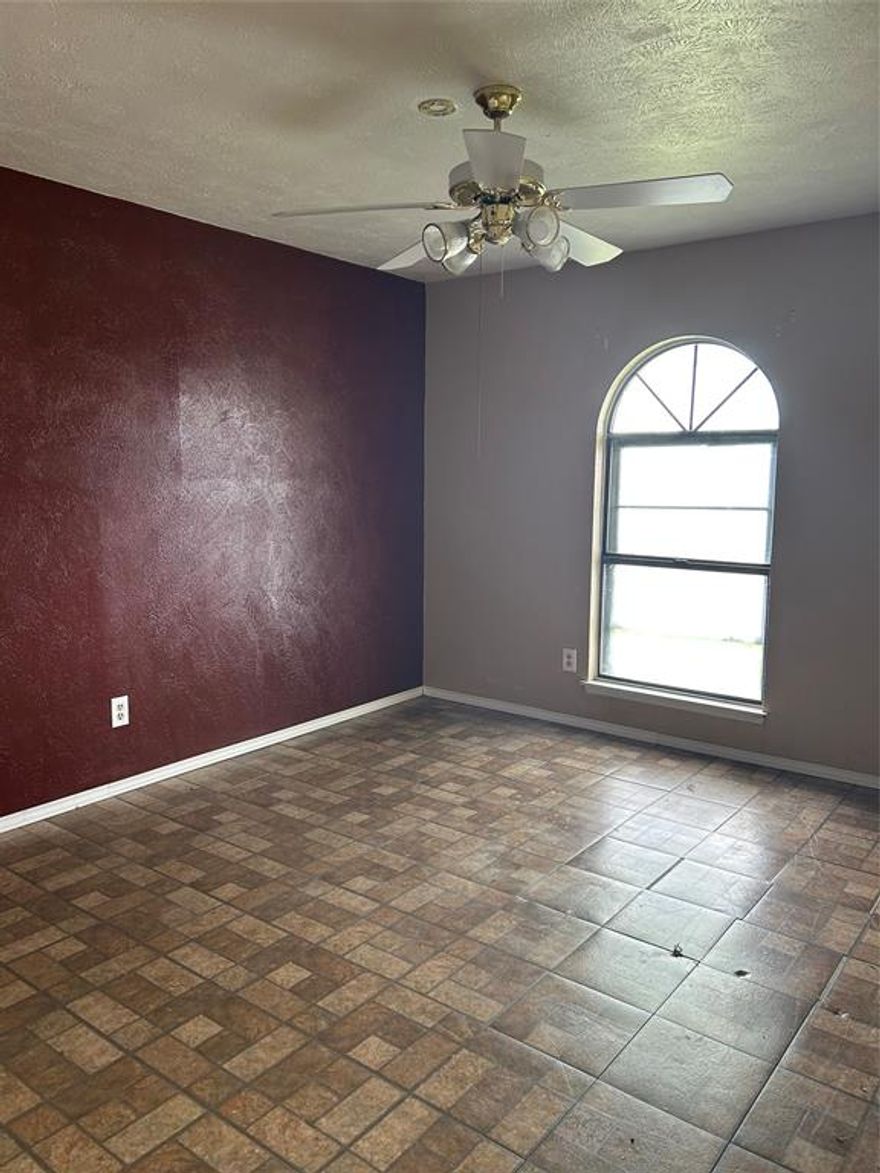 Great potential for investor looking to fix up and maintain as investment property or update and resale. Open floor plan in kitchen and family room with corner brick fireplace. Primary suite with ensuite bath that has had some updates. Second bath has also had some updates. Garage converted to additional bedroom but can be converted back and used as 2 car garage. Spacious backyard with storage building. Close to Ford Middle School, parks and play grounds. NO HOA so rental properties are ok. Seller is in process of getting roof replaced through insurance.