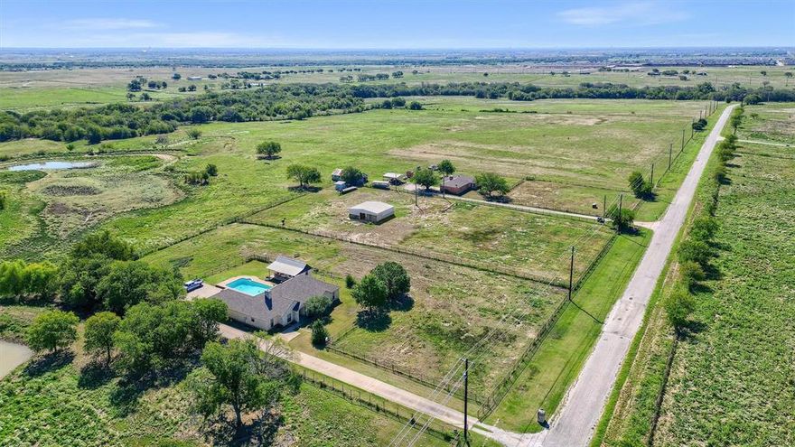 Fantastic 5.4-acre tract on Lights Ranch Rd with no restrictions! This property includes three parcels, which can be sold together or separately. The main home is approximately 2,700 sq ft, featuring 4 bedrooms, 3 bathrooms, a game room, and a pool. The second home is around 1,200 sq ft with 2 bedrooms. Both properties are currently rented. With the area’s anticipated growth, this property has great potential for commercial use or as a school or business.