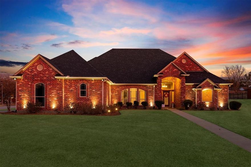 Checking all your boxes here! This Single Story classic beauty sits pretty on a generous HALF-ACRE CORNER LOT with a side entry 3 car garage for all the extras. Fall in love with the curb appeal and then stay forever as you behold the amazing backyard oasis, newly fenced, offering plenty of space and privacy. Just in time for summer, get ready to entertain guests splashing in the sparkling salt water pool, spread out under the oversized covered patio, or cozy up by the firepit. Inside, you're greeted by soaring ceilings and an abundance of natural light! This easy and open floor plan features 4 spacious bedrooms, including a guest suite with its own en-suite bath, 2 separate bedroom adjoined by Jack and Jill bathroom and a spacious Primary Bedroom offers 2 separate walk in closets, dual vanities and a luxurious jetted tub. Hardwood floors sparkle in the formal dining room as the cozy fireplace in the formal living room beckons you. The kitchen is a chef's dream with double ovens, SS appliances and granite countertops and a breakfast bar that opens to the extra-large family room complete with a fireplace and breathtaking views of the outdoor space.