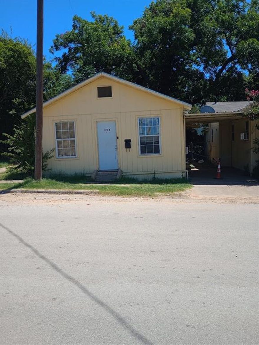 This is one of four listings in this remarkable 9-unit single-family portfolio. Welcome to: 2317#A & 2317#B Anna! This listing includes 2 of the total 9. Both addresses are their own stand alone homes right next to each other. FULLY OCCUPIED, TOTAL RENT: $2350 combined, Unit A- $1,000, Unit B- $1,350. As-is, Where-is. 

***9-UNIT CASH-FLOWING RENTAL PORTFOLIO - WITH OWNER FINANCING AVAILABLE!!*** This is a rare opportunity to acquire a stabilized, fully-occupied rental portfolio in the rapidly growing West Meadowbrook area of Fort Worth. This area is being revitalized and has long-term growth potential - You dont want to miss this!! QUICK HIGHLIGHTS: • Stable rental income at full occupancy with easy upward rent potential as leases renew. • Additional value-add opportunity with vacant lot space and existing utilities for new builds or expansion. • Located in an Opportunity Zone – offering potential tax advantages. • 100% Occupied & Rent Producing. • Owner Financing Available – With attractive terms! • Current Gross Rents: $8,560 per month with upside potential. • Walking distance to Downtown Fort Worth, I-30, Beach St, and Lancaster Ave. • Up-and-coming neighborhood with strong rental demand. *FULL TURNKEY PORTFOLIO COMBINED INTO THESE 4 LISTINGS: • (MLS #21020083) 2517 & 2517B & 2519 Bomar – Duplex + detached apartment. • (MLS #21019902) 2104 Taft A & B – Large home + smaller home on same lot, plus large rear lot for additional building sites. • (MLS #21019956) 2503 & 2505 Wilkinson – Duplex. • (MLS #21020042) 2317 Anna #A & #B – Two separate detached rental units.