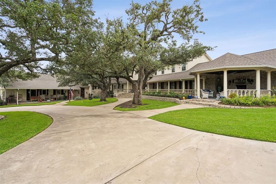 Impeccable Texas style and grace found in one of Granbury’s most desirable gated communities. Welcome to Grand Harbor. A show stopping, multi-generational, or entertaining masterpiece, with 9 bedrooms, 6 full baths and 2 half baths. This expansive home offers something for those who need space for big families, large summer gatherings or just hanging out on the weekends.  Built intentionally to take full advantage of the incredible lake views, there are numerous porches and peaceful sitting areas to enjoy coffee at sunrise or to relax at sunset. Plans include an attached guest cottage for privacy and convenience if guests are staying for a while or visiting relatives.  The guest cottage offers a complete kitchen, living and dining room to serve as a fully functional attached home.  Does water make your heart sing? You’ll be dancing with joy. This property includes the best of both worlds, a premier waterview and an unusually deep water boat dock that’s hard to beat. The 545 foot of waterfront is awesome for boaters and fishermen, the water access to this home might just make your waterfront dreams come true! There is few homes on the lake that offer this type of water depth and location to all of the local hot spots!  There’s an oversized garage and circle driveway to make parking a pleasure, not a fight, and a large lot to give you plenty of room to add on or build something additional.  Situated on one of the original tracts of land developed in the Grand Harbor, this home also sports classic construction that has aged exceptionally well and is ideally located within the neighborhood. From the oversized primary bedroom to the livable common areas, this property has been designed and built with a thoughtful eye for details. With generational live oak trees, lots of space, breathtaking views, and sought-after neighborhood, this home offers location, location.