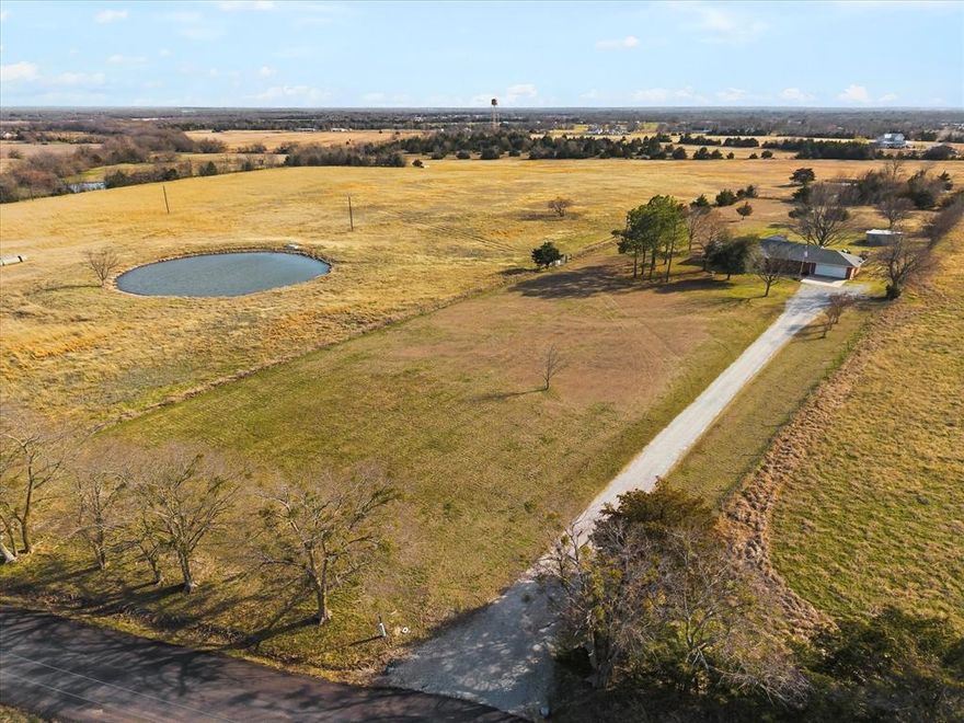 32 Acres of Peaceful Country Living Just Minutes from Commerce. A pristine, well-maintained home nestled on 32 beautiful acres of open space and privacy. If you’ve been searching for Texas land for sale with a move-in ready home, this one checks the boxes. From the moment you step inside, you’ll feel it, this home has been cared for with pride and it shows. The interior is exceptionally clean and thoughtfully maintained, offering a sense of comfort and calm that makes you instantly feel at home. Large windows (new in the majority of the home) invite in natural light and scenic views of your surrounding acreage. Major updates provide peace of mind. All major systems have been consistently serviced and maintained, making this property truly move-in ready. Located approximately 5 miles from East Texas A&M University, you’ll enjoy a convenient drive into town, yet the setting feels worlds away from the hustle. Here, you get the rare combination of accessibility and total tranquility. Homes with this level of care and location don’t come along often.