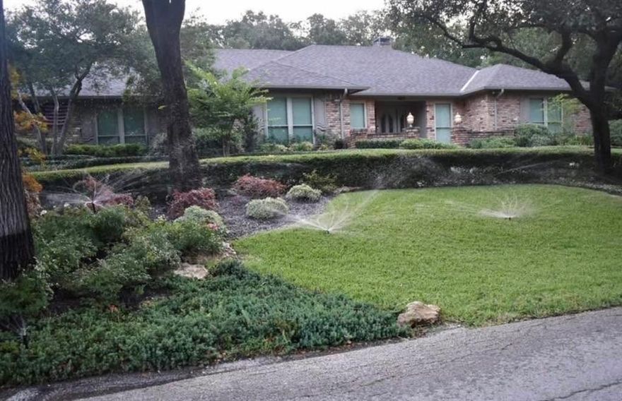 The property includes a separate garage studio apartment. Located on a heavily wooded and landscaped site. Home is Chicago brick with a Class 4 shingle roof and a circular drive in front. The main house is a 4 bedroom, 2.5 bath with a living room, sun room, kitchen, breakfast area, dining room, and entry gallery. Recent updates include new paint, granite counter tops, HVAC, water heater, insulated windows, plumbing fixtures, light fixtures and new locks, hinges and hardware. New wood flooring throughout the house with the kitchen, breakfast, sunroom and baths finished in travertine porcelain tile. The master bath has a shower and a jacuzzi whirlpool bath tub and his and hers lavatories and closets. The attached 2 car garage has wall cabinets added, HVAC and space for an extra refrigerator. Exterior has new gutters and down spouts, with a stamped concrete rear patio of around 2000 sf. which connects the main house to the apartment. The lawn is irrigated. The house is bright inside and faces south. The neighborhood is very quiet with no train or plane noise and very few cars use the street. Behind the house is a 2 story building with a studio apartment over a 2 car garage. The apartment has a large bedroom and living area with a full bath, kitchenette with refrigerator, microwave and a new mini split HVAC system. Perfect for rental if so desired. The secondary garage has a work bench, sink, laminate wall cabinets and AC. The back yard has a 8’ high cedar fence and a small tool shed behind the apartment. The house is 2892 sf plus the garage.The apartment adds another 552 sf up and down. The location is minutes away from Lake Arlington, the new Senior Center, great schools, and easy access to I20, I30, Green Oaks Blvd and Hwy 287. Only a mile to banks, restaurants, grocery stores, etc.