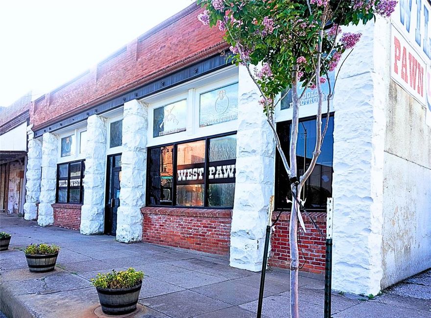 Now is the time to buy in up-and-coming Sherman, Texas!  Offering investors or business owners an incredible opportunity for an unlimited number of business uses, this C-2 Commercial zoned property allows a wide range of retail and wholesale uses in addition to all permitted C-1 uses. The one-level 5,000 sf building space has an ideal large open configuration; interior walls could be easily erected to fit specific purposes. Currently, there is a non-structural framed sheetrock wall separating approx. 40% of the square footage in the back. Perimeter walls are original brick with plaster overlay and a few areas where brick has been intentionally exposed for aesthetic purposes.  Two functional bathrooms in front and two plumbed bathrooms without fixtures in back. Building and property have been well maintained. A ramp and loading dock with an 8' rollup door provides easy delivery access. Adding exceptional value, the second parcel in this sale is the adjacent 5000+ sf parking lot. All information presented deemed to be reliable, but buyer and their agent must verify accuracy of any and all information.