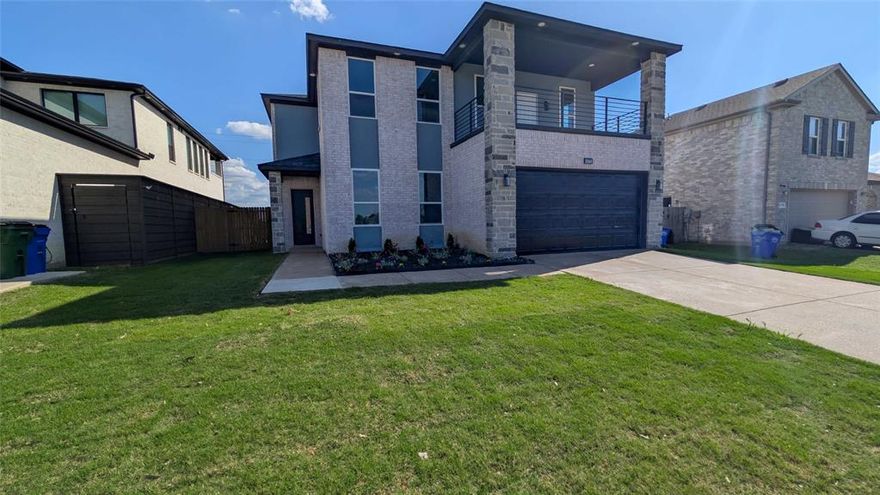 Forget the high-priced cookie-cutter production houses with their boring, basic, one-size-fits-all designs. This home is the total opposite. Meticulously engineered & filled with upscale, custom features, every detail has been intentionally crafted for a luxury experience. Experience the charisma of contemporary design in this stunning 3,223 sq. ft. Like new construction 2-story brick home. Every element above the foundation is brand new, offering the peace of mind of new construction with the charm of a modern established neighborhood. This 5-bedroom, 3-bathroom masterpiece features a rare dual-master layout—with large suites on both levels—& a versatile 1st-floor in-law suite with a connected bath. Featuring a massive balcony with an incredible view—a rare luxury you won't find anywhere else in the neighborhood. The interior boasts soaring 10-foot ceilings on the main level & 9-foot ceilings above. The chef’s kitchen is a showstopper, featuring a waterfall granite island, premium stainless appliances, & a designer pantry. Retreat to the massive second-story balcony or enjoy the multipurpose upstairs loft. From the dual HVAC systems & new roof to the coffered ceilings, every fixture reflects high-end, upscale housing standards. Complete with a new sprinkler system & fresh sod, this is truly the right house at right price at the right time.