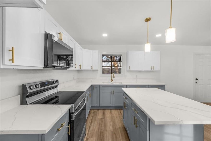 Welcome to this beautifully renovated home that blends modern upgrades with inviting charm. As you arrive, you’ll be greeted by a long paved driveway offering ample parking, in addition to a convenient two-car garage. Step inside to discover a unique and welcoming layout. Just beyond the front door, a large picture window fills the space with natural light, an ideal spot to create a cozy window nook. The heart of the home is the stunning kitchen, featuring brand-new cabinetry, elegant quartz countertops, and plenty of space for gathering and entertaining. This home offers three generously sized bedrooms, including a spacious primary suite with a modern ensuite bathroom. Out back, enjoy a private, fenced backyard with no back neighbors, perfect for relaxing or hosting guests. Additional upgrades include a new HVAC system, new flooring, updated bathrooms, new cabinets, and fresh paint throughout. The roof and foundation are both in excellent condition. This move-in-ready home truly has it all!