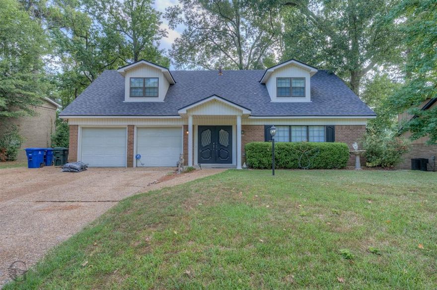 Incredible four bedroom home has a lot to offer. Two living areas allow you to make the layout whatever you would like for your family. One room could be a large formal dining room, office, playroom, or formal living area. The oversized back yard and covered porch area make this an ideal entertaining area for family or friends. Conveniently located close to Mansfield Road and great access to all major highway systems and loops.