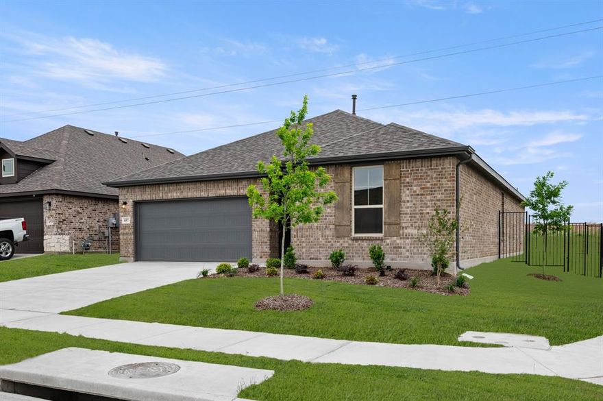 MLS# 21136270 - Built by HistoryMaker Homes - Ready Now! ~ Ready NOW! Reduced pricing PLUS up to $30,000 to spend your way until 4-30! Discover this stunning single-family residence in the desirable Godley Ranch subdivision, offering 4 spacious primary bedrooms and 2 full bathrooms within 2,019 square feet. Set on a corner lot adjacent to a serene greenbelt, this home boasts an open floorplan with a gourmet eat-in kitchen featuring gas cooktop, granite counters, a large island, and a pantry. Enjoy the convenience of high-speed internet, walk-in closets, and a cozy living area which is full of natural light. The exterior includes a well-maintained private yard with a sprinkler system & rain gutters. Located in the highly regarded Godley ISD, residents will appreciate proximity to local schools. Additional highlights include a central heating, tankless water heater, and cooling system, a two-car garage, and a blend of elegant flooring options. Don't miss the chance to make this your dream home! Low tax rate & low annual HOA dues. Walking distance to High School and middle school. Community offers a large dog park, play ground & covered pavilion.