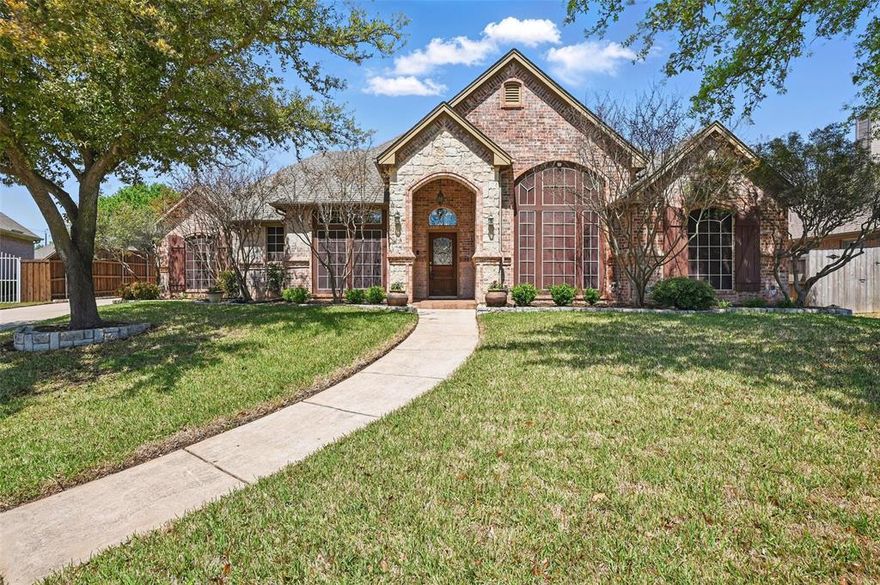 Fall in love with this meticulously maintained single-story home on a quiet cul-de-sac in the highly sought-after Brandonwood Estates. Located within the award-winning Keller ISD and just moments from Founders Park, Sky Creek Ranch Golf Club, and the famous Green Valley Raceway. This property offers an unbeatable combination of comfort, elegance, and convenience. Featuring four spacious bedrooms, three full bathrooms, including a charming Jack-and-Jill and two distinct dining areas providing a functional and flexible floor plan. Upon entry, you’ll be captivated by the home’s details, elegant columns, classic arches, exquisite custom crown molding, plantation shutters, and beautiful hardwood flooring. The expansive living room features a stunning stone gas fireplace and plenty of natural light entering from the tall windows. The gourmet kitchen is truly the heart of the home, offering sleek granite countertops, stainless steel appliances including a gas cooktop, and abundant cabinetry, perfect for any culinary enthusiast! Retreat to the master suite, complete with dual vanities, a stand-up shower, a soothing jetted tub, and a spacious walk-in closet. Step outside to your private backyard oasis, where a sparkling swimming pool with an attached spa awaits, alongside a generously sized covered patio, ideal for entertaining year-round. A long driveway provides ample parking and leads to a two-car garage, adding to the home’s practical appeal. Don’t miss your chance to make it yours. Schedule your private tour today!