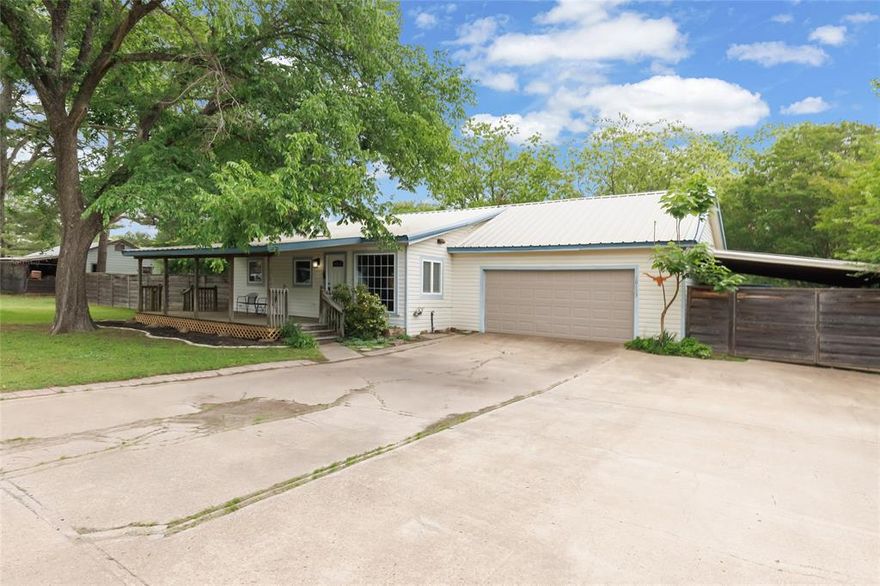 Whether you're searching for a full-time home or the perfect weekend retreat, this beautifully updated property offers the best of lake life—situated in a lovely community with access to Lake Tawakoni, famously known as the Catfish Capital of Texas! Set on three generous lots with stunning curb appeal, mature shade trees, a spacious front porch, metal roof, and ample parking space—perfect for guests, boats, and recreational vehicles alike! This property offers the perfect blend of style, comfort, and outdoor adventure! Step inside to discover a thoughtfully updated interior with a bright, open layout, and split-bedroom floorplan. The stunning kitchen is a true showstopper, complete with modern appliances, granite countertops, luxury vinyl plank flooring, a deep farmhouse sink, pantry storage, stylish backsplash, and eye-catching two-tone cabinetry! The spacious family room serves as the heart of the home, highlighted by a beautiful stone fireplace—perfect for cozy evenings by the fire! The primary suite provides a relaxing retreat and boasts a gorgeous vanity countertop and walk-in closet! Step outside and enjoy a large, fenced yard with room to roam, plus a storage building and covered boat parking—perfect for keeping all your lake essentials ready to go! The community amenities elevate the experience with access to a private boat ramp, fishing pier, swimming area, rentable clubhouse, playground, and more! Outdoor enthusiasts will also love being just minutes from Lake Tawakoni State Park, offering miles of scenic trails, campsites, and additional lake access! Conveniently located less than an hour from Dallas—making it the perfect escape without sacrificing the convenience of the city! Truly a must see!
