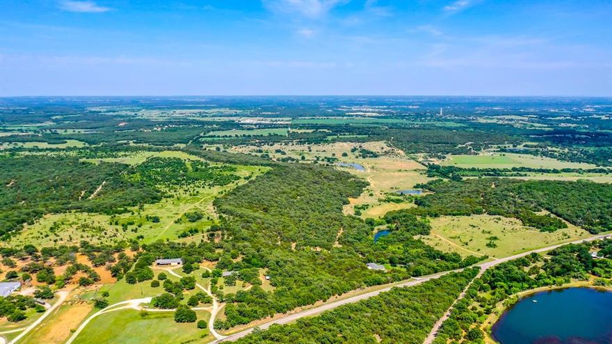 280 Plus acres, conveniently located just minutes north of the up-and-coming Mineral Wells.  This place has something for everyone, with 8 ponds, over 130 feet of elevation change, open pastures, and heavy cover.  Views of the Baker Hotel can be seen all along the hill side on the East, with Westerly views also available.  A variety of wildlife have found refuge in this picturesque property. The top of the hill is very level, offering a multitude of great homesites.  This property provides a fabulous opportunity to build a combination horse, cattle, and recreation ranch, with an incredible investment opportunity as Mineral Wells continues to grow.