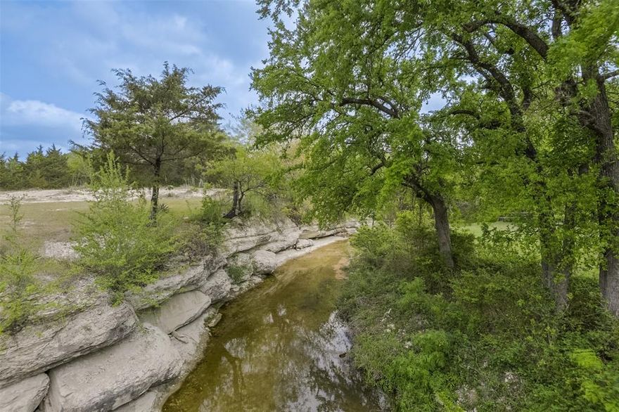 If you’ve been searching for a custom home on 10+ acres in Waxahachie with room for horses, a barn, and water features, 971 Bells Chapel checks every box. Set on over 10 acres in Ellis County, this property offers a rare combination of acreage, a creek, and functional improvements designed for country living. The immaculate custom home provides comfortable living space while the land truly sets this property apart. A barn, carport, and garage give you the infrastructure needed for animals, equipment, and everyday use. The presence of a creek running through the property adds both beauty and usability, creating a natural setting that enhances the land and provides a peaceful backdrop for daily life.
Located just outside the city with easy access to Highway 287 & I-35E, this property offers the feel of rural living while still being within close proximity to Waxahachie shopping, dining, schools, and healthcare, and a manageable commute to the DFW metroplex.
If you’re looking for land, a home with acreage, horse property with a barn, or a custom home on 10+ acres near Dallas, 971 Bells Chapel offers the space, setting, and functionality to create the lifestyle you’ve been wanting.
