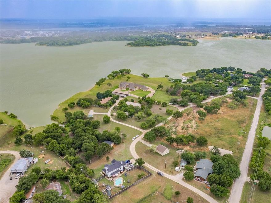 Welcome to Lake Lewisville's ultimate dream home opportunity! This remarkable offering presents two fantastic adjacent lots, combining to form an expansive .6-acre parcel, nestled against the breathtaking backdrop of the shimmering Lake Lewisville. Boasting incredible potential, this picturesque property invites you to envision the home of your dreams amid its serene surroundings. Imagine waking up to the tranquil sounds of nature and sipping your morning coffee while overlooking the serene waters from your future dream home. With a generous combined lot size, there's ample room to design and construct a custom residence that perfectly suits your needs and desires; the possibilities are endless. Don't miss this once-in-a-lifetime opportunity to create your own personal oasis on the shores of Lake Lewisville. Embrace the beauty of nature, the allure of lakeside living, and the limitless potential this exceptional property offers. Act now and make your dreams a reality.