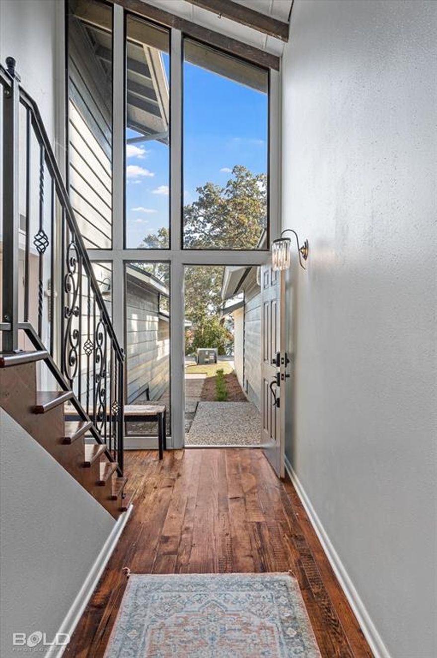 Beautifully updated and thoughtfully designed, this home offers the perfect balance of comfort, charm, and low-maintenance living. The renovated kitchen, centered around a generous working island, flows effortlessly into the main living areas—ideal for both everyday living and entertaining. Warm wood floors run throughout the main level, which offers two distinct living spaces, one anchored by a cozy fireplace, along with a convenient half bath.
Outdoor living is a highlight, with a spacious covered back patio providing a shaded retreat for relaxing or dining, as well as a quaint courtyard nestled between the garage and the house that adds privacy and character.
Upstairs, the home continues to impress with two guest bedrooms, each offering water views—one with its own private balcony—an additional full bath, and a spacious primary suite complete with double sinks, a walk-in closet, and a private balcony. Residents also enjoy access to a community dock with boat slips, along with subdivision pool and tennis amenities, creating an easygoing lifestyle designed for enjoyment rather than upkeep. There are two HOA’s here: approximately $300 ANNUAL to Willow Point HOA and approximately $130 MONTHLY to Willow Wood HOA.