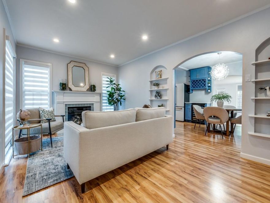 Nestled in the coveted M Streets neighborhood, this beautifully updated home seamlessly blends timeless historic character with sophisticated modern style. Featuring 3 spacious bedrooms, 2 full bathrooms, and a versatile bonus space perfect for a second living area, formal dining room, or office. This home offers both charm and flexibility!  Step inside to find all new flooring and designer light fixtures (2024), setting the tone for high end finishes throughout. The stunning, fully remodeled kitchen has been thoughtfully opened to the dining area and boasts matte black GE appliances, quartz countertops, shaker style cabinetry, a wine cooler, and designer gold hardware making this the perfect space to entertain in style! Retreat to the spa like primary en suite bathroom with a freestanding soaking tub, new vanity, modern stacked tile, and elegant finishes. Both bathrooms have been beautifully redesigned with LED lighted mirrors, new toilets, and sleek gold fixtures. Additional recent upgrades include HVAC system (2024) and tankless water heater (2025) ensuring comfort and efficiency for years to come. Don't miss your opportunity to own a truly special home that offers both historic charm with luxurious modern  upgrades-all in one of Dallas' most desireable neighborhoods!