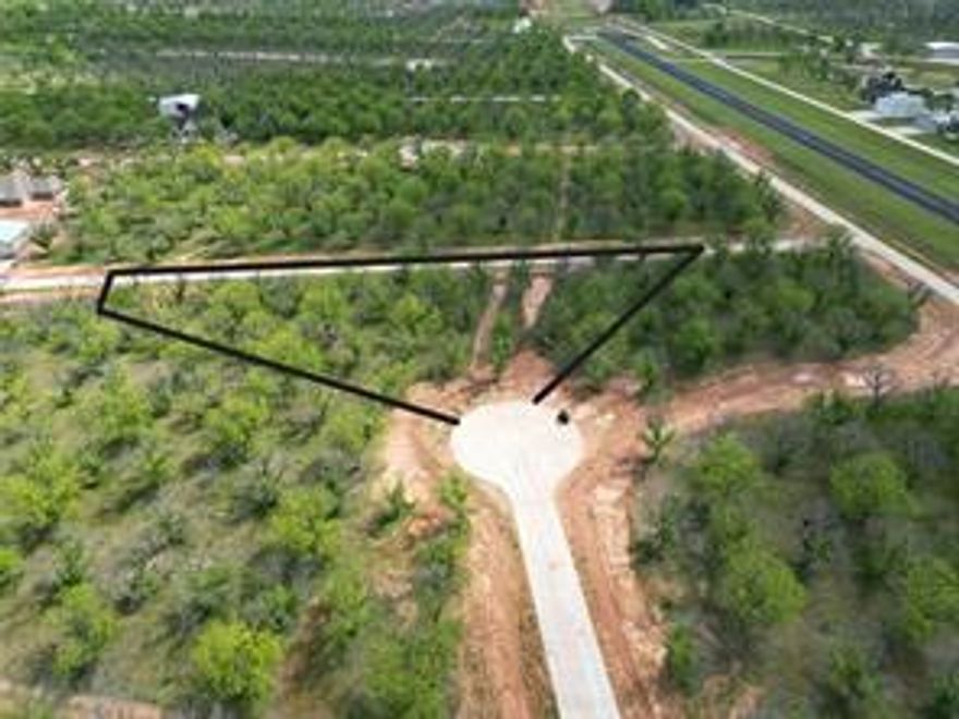 Experience luxury living at The Landings Airpark near Granbury, Texas. This 1.499 acre lot offers direct taxiway access to the runway at The Landings Airpark located within the exclusive Pecan Plantation Country Club community. Enjoy resort-style amenities including 2 airports, 2 golf courses, a marina, clubhouse with 2 restaurants, tennis village, shopping district, RV Campground, and more. With three beaches along the Brazos River, gated entrances, and endless activities, this is a lifestyle you'll never want to leave.
