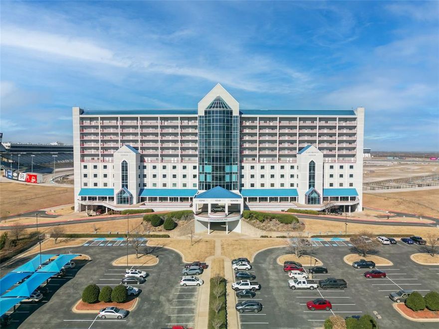 One of the most unique luxury condos in DFW! Unit #907 is on the TOP floor & overlooks Turn 2 on the track at the Texas Motor Speedway! Entertain friends, family, or clients from your fantastic condo! 3 beds, 3 baths! This home boasts 2500 sqft of living space! Whip up your favorite meals in your spacious kitchen with island. Enormous living & dining rooms! Awesome floor to ceiling windows! Watch the races with the best view in town! Built-in stadium seating & countertops! Pull down screens on trackside windows! Fantastic master bedroom with sitting area & huge walk in closet! Move in ready or add your personal touch to make it your own! Amenities: race tickets, Texas shaped pool, gym & garage parking! A versatile property with full or part time living, or as an investment property with long & short term rentals! Across from Tanger Outlets & restaurants! Year-round fun with car shows, concerts, events & holiday activities. Live here, play here, relax here, invest here at TMS!