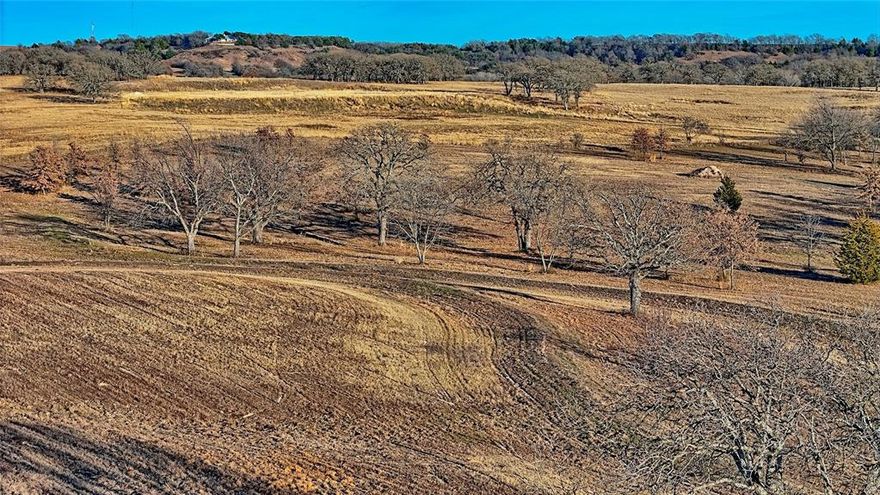 Ag-Exempt 27-Acre Retreat Near Historic Saint Jo
Discover your own slice of the North Texas Hill Country. Located just a few miles west of the historic and vibrant town of Saint Jo, this 27.45-acre tract offers the perfect canvas for your weekend getaway, cattle operation, or custom hilltop estate.

The Land & Location

This unimproved property boasts expansive views and the rugged, rolling topography that makes Montague County so desirable. With direct highway frontage, you have easy, year-round access while maintaining a sense of total seclusion. The acreage is currently Ag-Exempt, keeping taxes low while you plan your next move.

Prime Road Frontage: Easy access off Hwy 82.

Diverse Terrain: A mix of open grazing land and native brush, providing excellent habitat for local wildlife (deer, turkey, and dove).

Building Sites: Multiple elevated spots offer panoramic views of the surrounding valley—perfect for watching those famous Texas sunsets.

The Saint Jo Lifestyle

More than just land, this property offers a gateway to one of the most culturally rich areas in North Texas. You are minutes away from:

The Historic Square: Home to legendary live music at Red River Station, art galleries, and boutique shopping.

Texas Wine Country: A short drive to award-winning vineyards like Blue Ostrich and Arché.

Outdoor Adventure: Proximity to the Red River and Lake Texoma for fishing, boating, and trail riding.

Whether you’re looking to escape the DFW bustle (just a 90-minute drive away) or looking to invest in the growing North Texas corridor, this property delivers the space, peace, and potential you’ve been searching for.

No restrictions reported by seller—bring your horses, your cattle, and your vision!