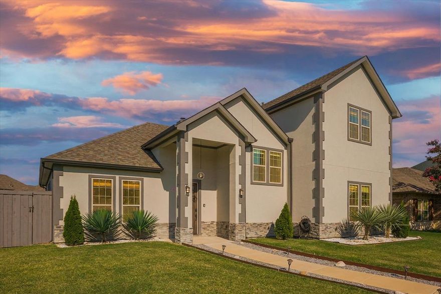 Experience luxury living in this stunning fully furnished home in Lake Bend Estates! This elegant retreat boasts a charming stucco exterior, sprawling front lawn, and meticulous landscaping, while inside, you'll discover a masterpiece of design with vaulted ceilings, abundant natural light, and upscale finishes. The gourmet kitchen is a culinary dream, with sixty four cabinets, stainless steel appliances, and granite countertops, while the cozy living room invites relaxation with its comfy furniture and warm fireplace. The hotel-inspired bedrooms are serene retreats, complete with luxurious linens, and the game room is the perfect spot to unwind with friends and family. The bathrooms are equally impressive, with granite countertops. But the real showstopper is the stunning backyard oasis, featuring a sparkling pool and outdoor kitchen with barstool seating - perfect for dining and entertaining. With everything you need included, from furniture to kitchenware, and proximity to Lake Ray Hubbard and Sapphire Bay Marina, this is the ultimate move-in ready dream home!