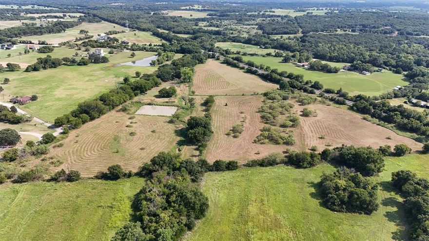 Discover your dream oasis on this expansive 6.467-acre parcel, nestled amidst serene countryside and neighboring a prestigious subdivision boasting grand homes on spacious 1-acre lots. Imagine crafting your ideal residence, with sweeping views of lush landscapes and breathtaking sunsets. This picturesque property features a tranquil pond and a loaf shed—perfect for cattle, horses, or other livestock. Currently used for agricultural purposes, this versatile property offers flexibility for future development. Conveniently located near I-35, you’ll have quick and easy access to the highway while still enjoying the tranquility of country living.
Whether you're looking to build a custom home, or invest in land with endless potential—this is the one you've been waiting for!