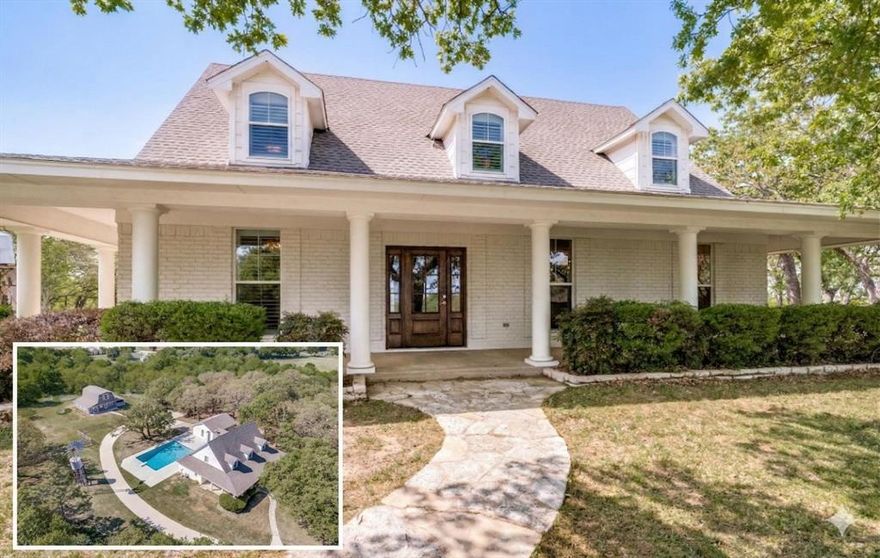 Tucked away on nearly 10 private acres, this elevated hilltop retreat offers a lifestyle that is becoming increasingly rare. The main residence features 3 bedrooms, 2.5 baths, and a versatile upstairs loft across 3,148 square feet, plus an additional 2,000 square foot fully renovated barn-style residence, bringing the property to over 5,100 square feet of total living space. Enjoy privacy, peaceful surroundings, and breathtaking views, all just minutes from the city. Inside, the fully renovated main home is loaded with custom upgrades and blends warmth with modern design, featuring an open-concept layout, vaulted living room ceilings, and a spacious living area filled with natural light and fireplace. The kitchen serves as the heart of the home, featuring a massive quartz island, stainless steel appliances, and an ideal setup for both entertaining and everyday living. The primary suite offers a comfortable and functional retreat with dual vanities, a separate shower, and dual custom closets. Upstairs, you’ll find two spacious secondary bedrooms along with a versatile loft, ideal for a home office, game room, or additional living space. Step outside to a large saltwater pool that provides the perfect setting to relax, entertain, and enjoying the natural surroundings. One of the standout features of this property is the fully renovated barn-style residence, featuring a large private bedroom, an open-concept living, dining, and kitchen area, a laundry room, a full bathroom, and an upstairs entertainment space with expansive windows designed to capture beautiful sunset views. This space is ideal for guest quarters, multigenerational living, or creating your own private getaway experience. This property offers a rare combination of space, privacy, versatility, and a peaceful setting.