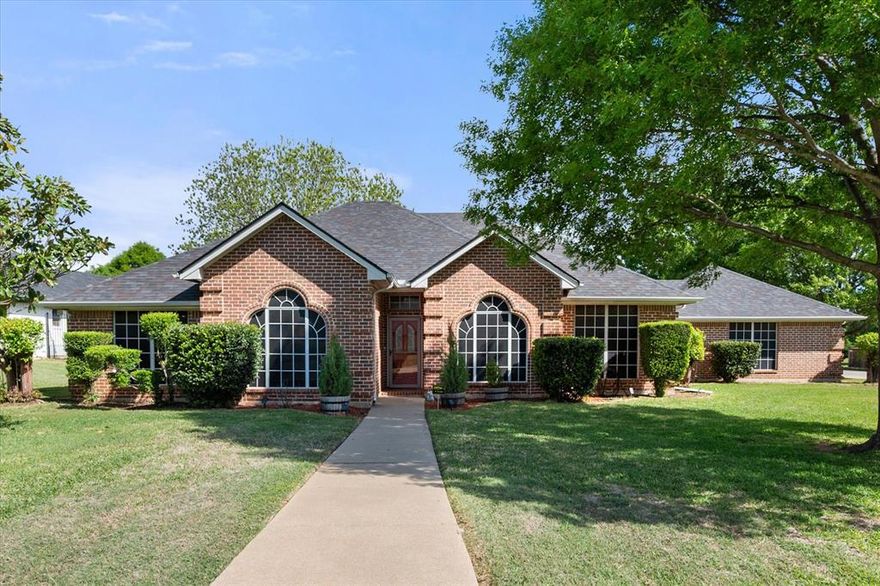 Situated on an almost half-acre corner lot, this well-maintained home offers space, privacy, and a long list of thoughtful updates. Featuring 3 bedrooms and 2.5 bathrooms with a desirable split-bedroom layout, this home is designed for both comfort and functionality. The oversized living room provides plenty of space for gathering and entertaining, while the updated kitchen shines with new countertops, backsplash, and modern laminate flooring installed in 2023. Major system upgrades add peace of mind, including a new HVAC system and ductwork (2021), a Class 4 impact-resistant roof (2024), and a new water heater (2024). Additional recent improvements include a new dishwasher (2025), microwave (2024), remodeled primary shower (2025), all toilets replaced (2025), and brand-new carpet in the bedrooms (2026). Outdoor living is just as impressive with an extended covered patio—perfect for relaxing or entertaining—along with partial new fencing, added gutter guards, storm doors, and solar screens for enhanced efficiency and comfort. This move-in-ready home combines modern updates with generous lot size—don’t miss your opportunity to own this exceptional property!