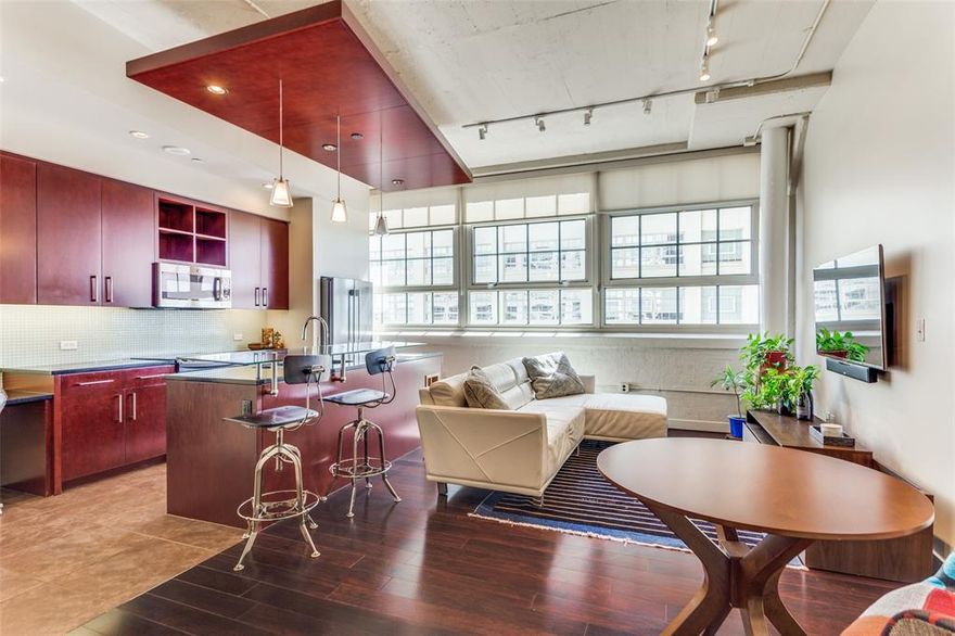 Montgomery Plaza condo living! This well designed two-bed, two-bath condo offers flexible living with split bedrooms. Spacious entry for art and furniture. The main suite includes a private ensuite bath with separate shower, garden tub, and stylish decor. Enjoy vibrant city views from front facing windows, perfect for people watching or taking in daytime and nightlife. The kitchen is thoughtfully laid out with raised bar, office nook, and space for dining. Features include granite counters, wood flooring, two deeded parking spaces #2159 and #2160. Resident amenities include a luxury rooftop pool, spa, outdoor living, grilling areas, cabanas, putting greens, indoor lounge, area, media room, and fitness center. 24-hour concierges. Gated dog run area. Public transit runs daily from OMP to downtown, cultural and entertainment districts. Easy access to I 30, I 35, and 121 for daily commute. Come see what Montgomery Plaza has to offer. Fridge, washer, dryer convey with unit. Furniture is negotiable.