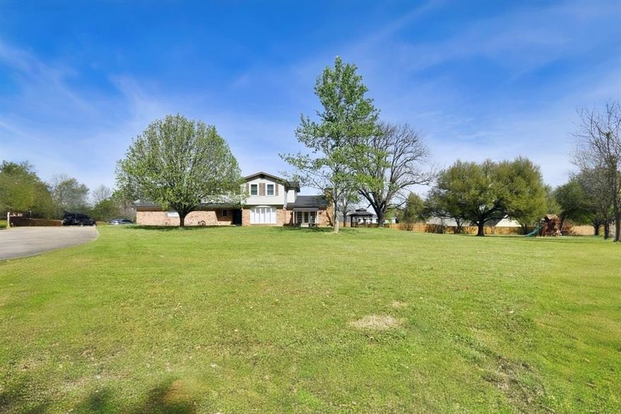 Sitting high on a hill in Winnsboro Tx, this 4,800 sqft home has had many upgrades and updates! This home is close to Winnsboro schools, downtown shopping, restaurants and hospital across the street. Home has 3 large bedrooms, 2 bathrooms and a half bathroom. Formal living and dining room combo being used as a double dining room, also a breakfast room next to kitchen. Huge family living room with wood burning fireplace and built-in bookshelves. Kitchen has center island and breakfast bar. Garage has been enclosed and finished out with 2 closets, perfect for a game room, man cave or an additional bedroom. Mud room next to kitchen with double sliding doors, open patio out front and a covered patio in back. This property has 1.69 acres, plenty of driveway parking, a gazebo with a swing and a kids playground set already in place. Home has fresh paint inside and out and new flooring within the past year. Located just 5 minutes to Lake Winnsboro Public Boat Ramp and 10 minutes to Legendatry Lake Fork Public Boat Ramp. Bring your best offer! Homes like this are becoming super rare! Schedule your showing today! Buyer to verify any and all information.