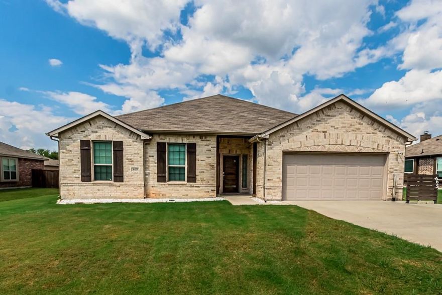 This 3 bedroom, 2 bath home offers 1,881 square feet of living space on a spacious 0.28 acre lot with no HOA. Built in 2020, it features a clean, modern layout with thoughtful design throughout.

Upon entering the home, you are welcomed by a warm and inviting entryway with upgraded board and batten detail. As you move down the entry hall, you will find custom floating wood shelves built into the wall, adding both charm and function.

To the left, a hallway leads to two bright secondary bedrooms and a full bath with separate vanities.

The main living space is open concept with designated areas for the living room, dining, and kitchen. The kitchen includes a large island, white cabinetry, and quartz countertops, offering both style and function.

The laundry room is oversized with additional workspace and leads to a built-in mud area near the garage entry with a bench and cubby storage.

Out back, the extended covered patio offers room to relax or entertain. The backyard also includes a large storage shed that stays with the property, providing extra utility and flexibility.