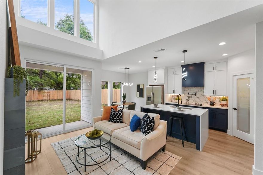 Modern design, natural light, and the kind of layout buyers actually want. 2312 Stoneman St brings bold modern design, thoughtful functionality, and elevated finishes together in one striking new construction opportunity just minutes from the heart of Dallas. Offering 2,106 square feet, 4 bedrooms, 3 full bathrooms, this home delivers style without sacrificing comfort. The moment you step inside, soaring ceilings and expansive windows fill the living space with natural light, creating an open and airy atmosphere that feels both impressive and inviting. The sleek fireplace wall adds warmth and character, while the open-concept design flows effortlessly into a standout kitchen featuring custom two-tone cabinetry, quartz-style surfaces, statement lighting, abundant storage, built in appliances with refrigerator included, and a large island ready for casual mornings or weekend gatherings. The primary suite offers a calming retreat with generous space, backyard views, and a spa-inspired bathroom completed with a dramatic walk-in shower and refined designer finishes with LED lighting. Upstairs, the media room gives you flexible space for movie nights, gaming, a home office, or second living area, while the second-floor patio creates the perfect place to enjoy your morning coffee or unwind in the evening. Spacious secondary bedrooms, modern fixtures, clean architectural lines, and quality craftsmanship continue throughout the home. Outside, the fenced backyard offers room to play, entertain, garden, or simply enjoy your own outdoor space. Located near Downtown Dallas, Fair Park, Deep Ellum, major highways, dining, entertainment, and everyday conveniences, this home combines fresh construction with city accessibility and modern lifestyle appeal. Schedule your showing and experience it for yourself.