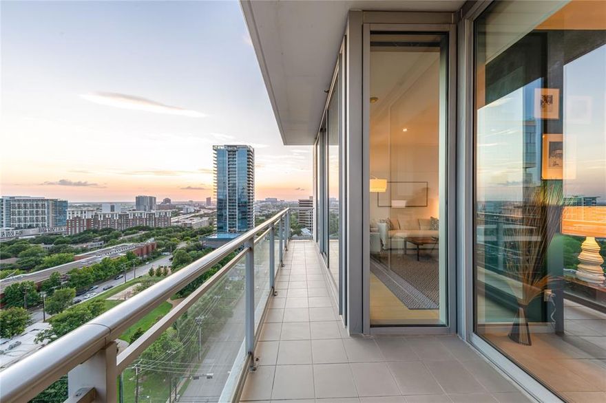 Luxury high-rise living at The Azure from this beautifully appointed 15th-floor residence with floor-to-ceiling windows and an expansive terrace featuring an outdoor fireplace and stunning sunset views.  The open living, dining, and kitchen areas offer wide-plank bamboo floors and abundant natural light.  Gourmet kitchen with Miele & Sub-Zero appliances and large island with breakfast seating for four.  Primary suite includes terrace access, custom closet, and spa-like bath.  Includes privacy shades, half bath, utility closet, and one reserved garage space - a possible second space available for lease.  Enjoy 24-7 concierge, valet, resort-style pool, fitness center, and prime Uptown location near Katy Trail, AAC, and Klyde Warren Park.