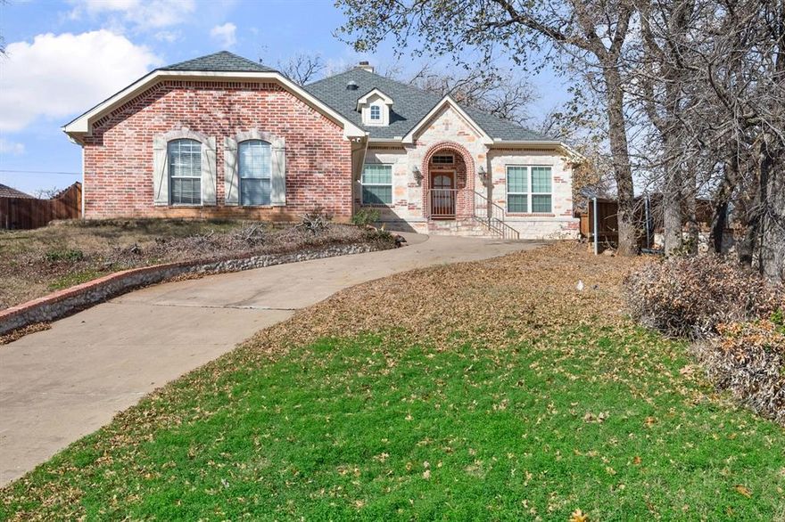 Beautifully appointed home situated on a corner cul-de-sac in desirable  Wintergreen of Hurst.  Upon entering you are greeted with a formal living room and high ceilings. The large kitchen offers granite countertops with a breakfast bar and is over to the living room.  The living room is the heart of the home and had an impressive stone fireplace. The split layout offers the master retreat privacy, located at the rear of the home.  You will enjoy the wood floors throughout the home, carpet free! The backyard is low maintenance and offers mature fruit trees such as peach, donut peach and nanking cherries.