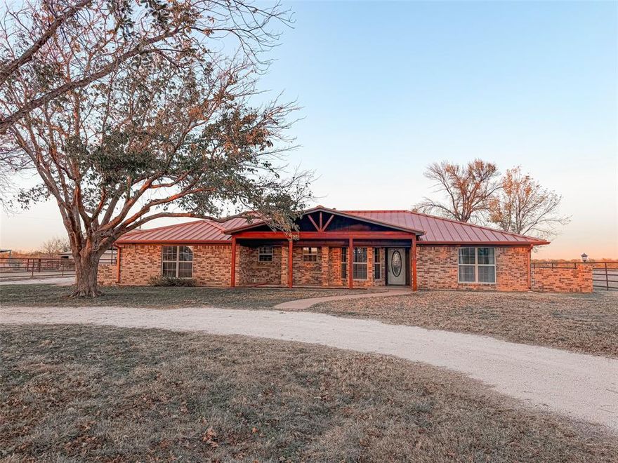 Country Living at its finest. Located just outside of Abilene city limits, (Wylie ISD. This 3 bed 2 bath home features large bedrooms, Large living area and kitchen, Wood burning stove in living area, stained wood paneling in main areas, granite countertops in kitchen and bathrooms. Recessed lighting, eat in kitchen, double oven, bay windows and spacious laundry area with built in desk. Many updates to the home, Class four metal roof with certification certificate, paint, AC, hot water heater, flooring, windows, wood stove and kitchen appliances. Do you enjoy entertaining company? This home has a great outdoor area to have friends & family over! Covered back patio with an added gazebo area for additional coverage. Fenced in back yard with black wrought iron fencing that has added concrete footing. 2 car garage, detached double carport that can also provide coverage for an RV, circle drive, fenced in acreage, Metal storage buildings with roll up doors, Barn for any live stock! This one is a must see!